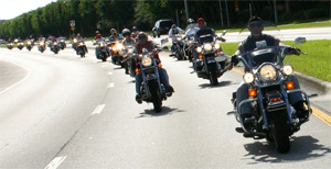 When riding with a group of motorcyclists a staggered formation: