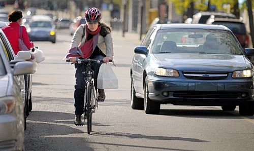 When passing a bicyclist, you should have at least ____ between you and the bicyclist.