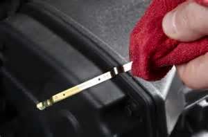 When should you especially check the engine oil level?