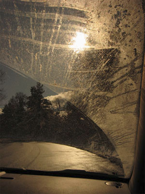 Bright sun or headlights on a dirty window make it easier to see out.