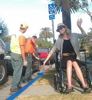 Disabled persons who display their placard can park at a __________ painted curb.