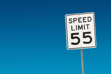 A posted speed limit of 55 mph means: