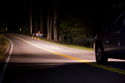 At night, a driver should dim his headlights when an oncoming motor vehicle comes within: