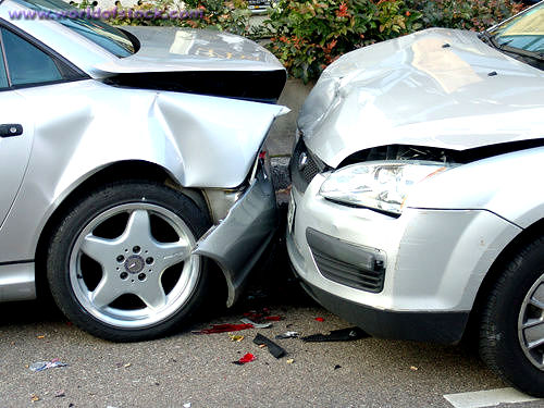 You are involved in an accident and someone is injured. You should: