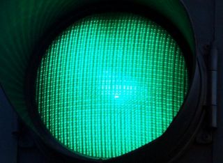 This green traffic signal indicates that: