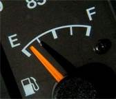 You should fill up your gas tank when it is just above the E or EMPTY mark.