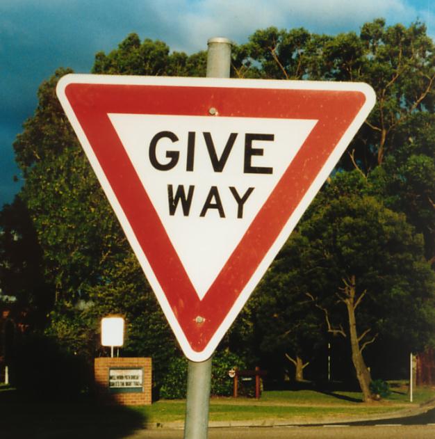 When you see this sign you must do which of the following?