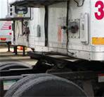 Before you back under the trailer, you should be sure that the trailer brakes are?