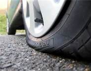 If your tyres are punctured on a motorway and you get your vehicle on the hard shoulder, you should: