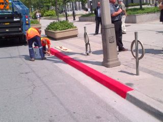 A curb painted red means: