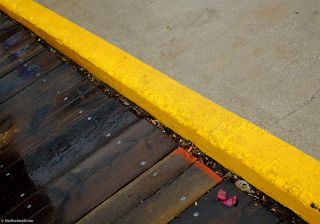 What do yellow painted curbs mean?