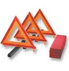 If you are stopped on a one-way or divided highway, you should place reflective triangles at: