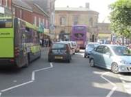 When waiting to emerge at a junction and view is restricted by parked vehicles, you can do which of the following to see traffic you are joining?