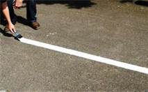 The solid white line at the side of a road indicates: