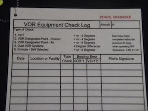 Which data must be recorded in the aircraft logbook or other record by a pilot making a VOR operational check for IFR operations?