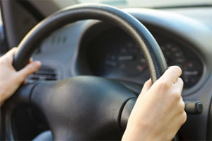 Modern vehicles require very little steering to turn. Look at the steering wheel as a clock face and place your hands at: