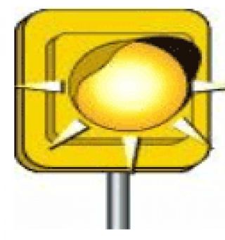 What does the Flashing Yellow Light at a road intersection indicate?