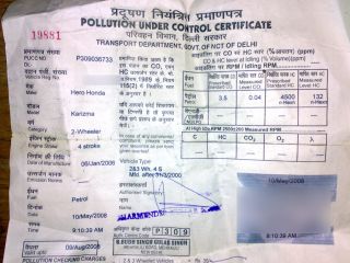 The driver of a motor vehicle does not need to procure the 'Pollution Under Control Certificate' till the expiry of _____ period from the date on which the motor vehicle was first registered.