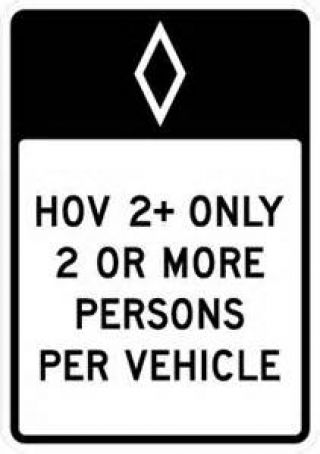 When can you drive in a lane marked with this sign?