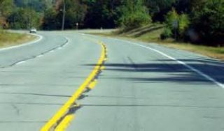 __________ on your side of the road indicates a no-passing zone.