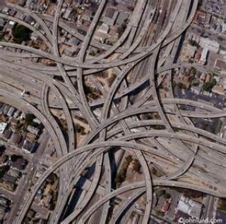 An __________ is the connection of a freeway to a road or another freeway by a series of ramps.