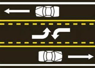 On a two-way roadway with a center lane, drivers from either direction can make _________ on the center lane.