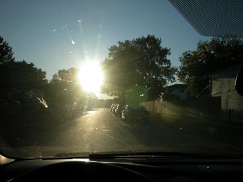 You must use _______ when the sun is shining brightly or when a line of cars following you could obscure your turn signal light.