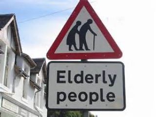 When you see an elderly person crossing an intersection, you should: