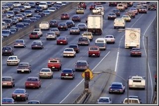 If traffic from another roadway is merging into the roadway you are traveling on, you must: