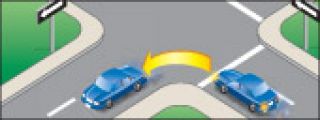 To turn left from a one-way street to another, a driver must begin the turn: