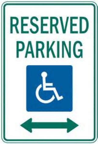 This sign marks a reserved parking space for: