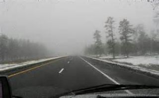 Rain, snow, and fog reduce visibility, so drivers should use _________ in such situations.