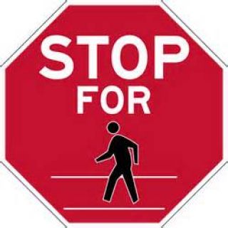 If there are no traffic control signals, drivers must slow down or stop for pedestrians within:
