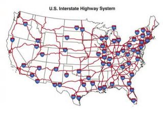 For interstate driving, slow-moving vehicles must travel _________, except when passing.