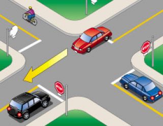 When making a left turn at a controlled intersection, a motorist (black car) must yield to: