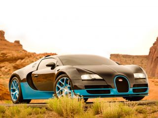Which Autobot's vehicle form is a 2013 Bugatti Veyron Grand Sport Vitesse?