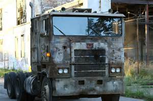 Which Autobot is a rusty Marmon cabover semi-truck?