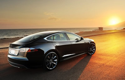 How far can you go in a Tesla Model S on one full charge? (with 85 kWh battery)