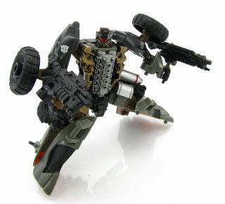 What is Backfire's vehicle form in Dark of the Moon?