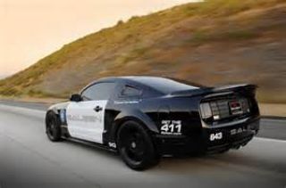 Which Decepticon's vehicle form is a Ford Mustang Saleen?