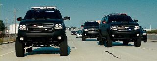 Which Decepticon's vehicle form is a Chevrolet Suburban in Dark of the Moon?
