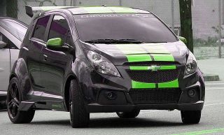 Which Autobot's vehicle form is a 2012 Chevrolet Spark?